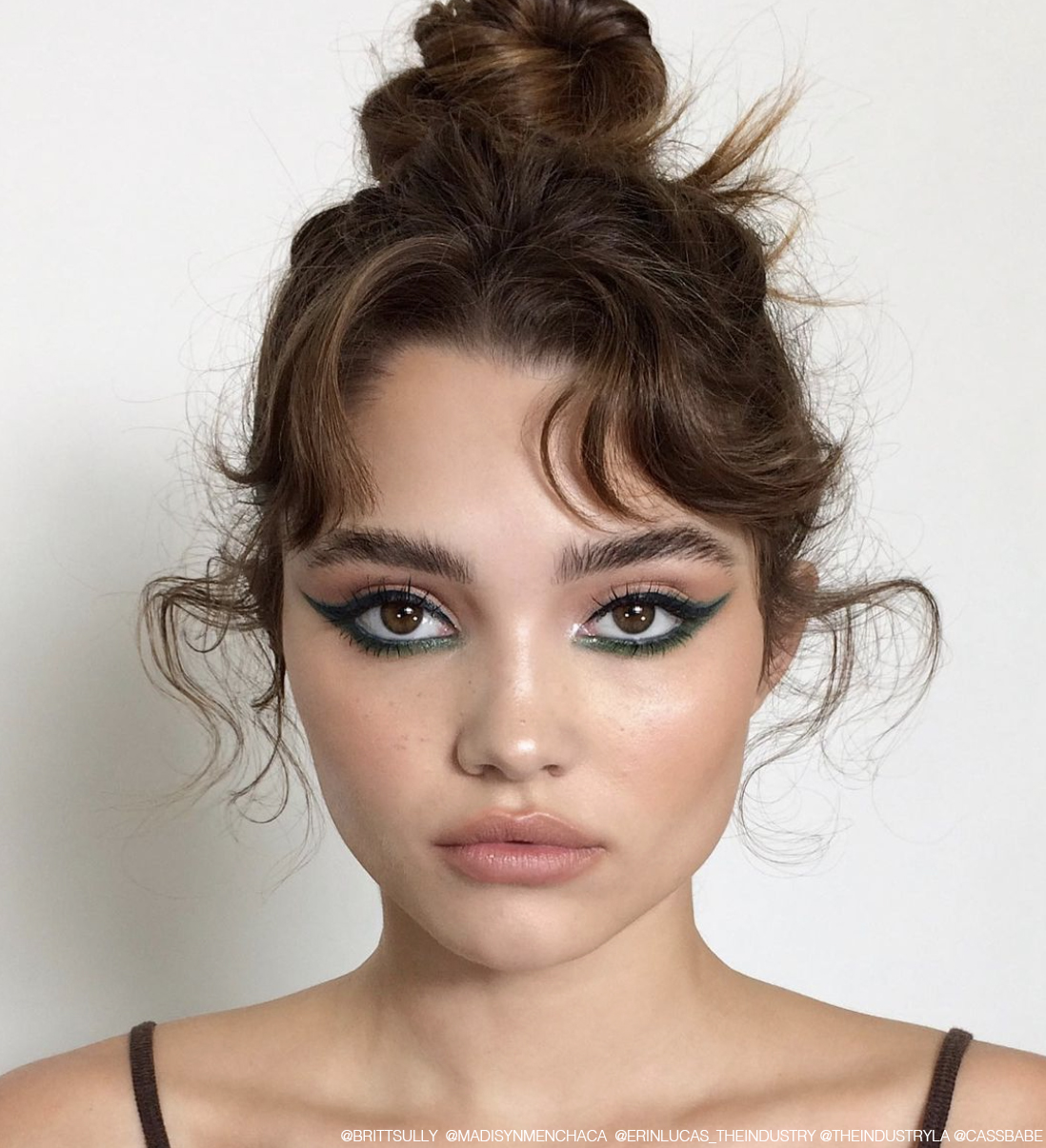 3fe18303e1332e8603a4 messy bun