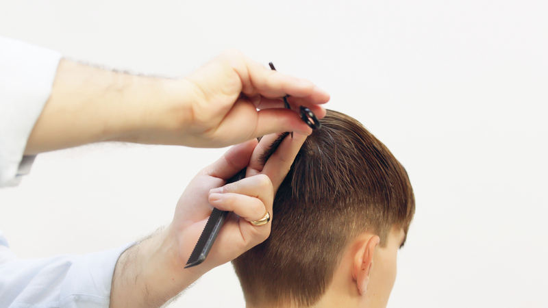 Photo of a haircut tutorial on a male model