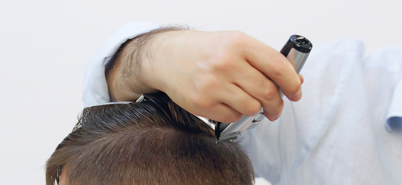 Photo of a haircut tutorial on a male model