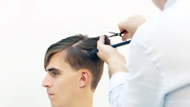 Photo of a haircut tutorial on a male model