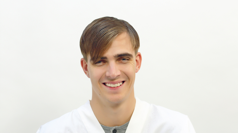 Photo of a man with a side part