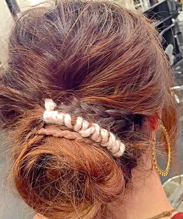 Classic bun with a boho twist/Nikki Suarez/Texture.Master Comp