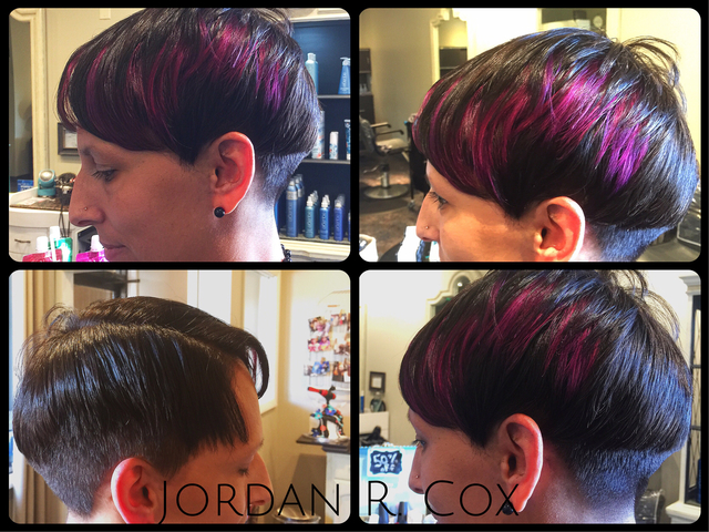 Layered pixie undercut with vibrant highlights. 