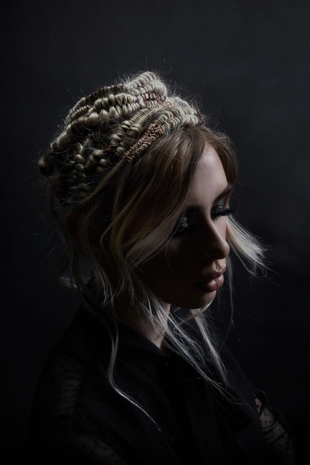ADORNED IN BRAIDS