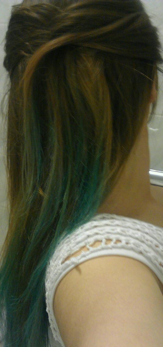 Long natural straight brown, blonde and bubblegum blue ombre.