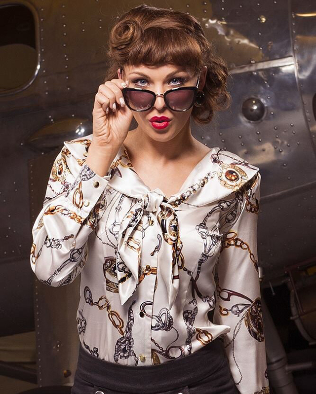 Hair: Brynne Dubin
Makeup: Kami Tafoya
