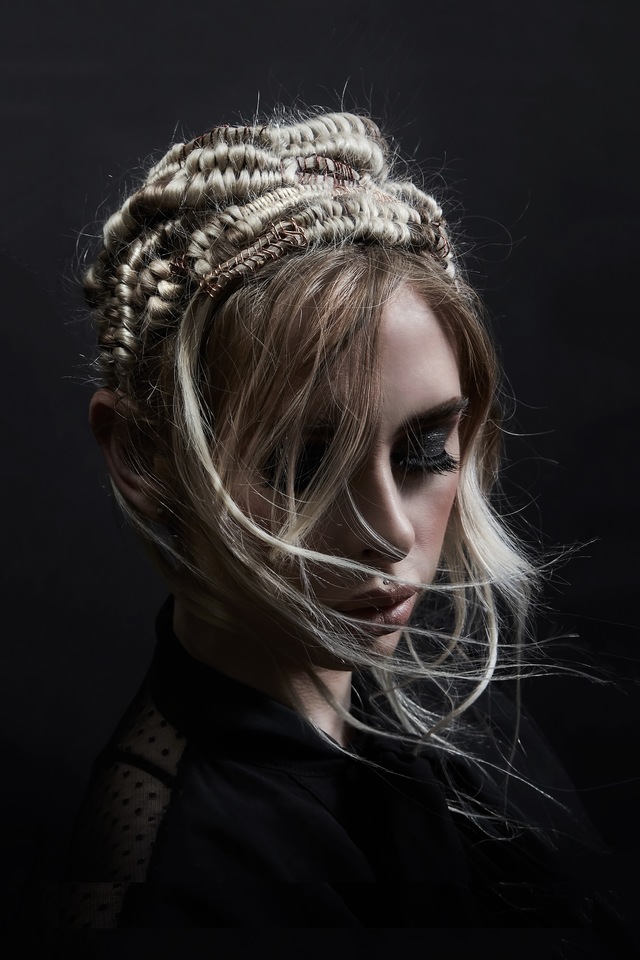 ADORNED IN BRAIDS