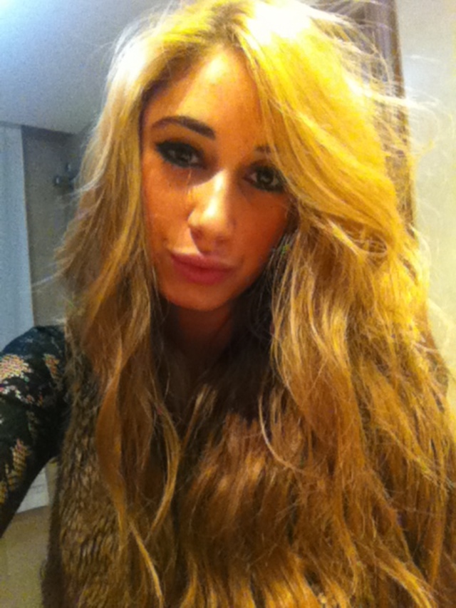 Wavy hair with volume.