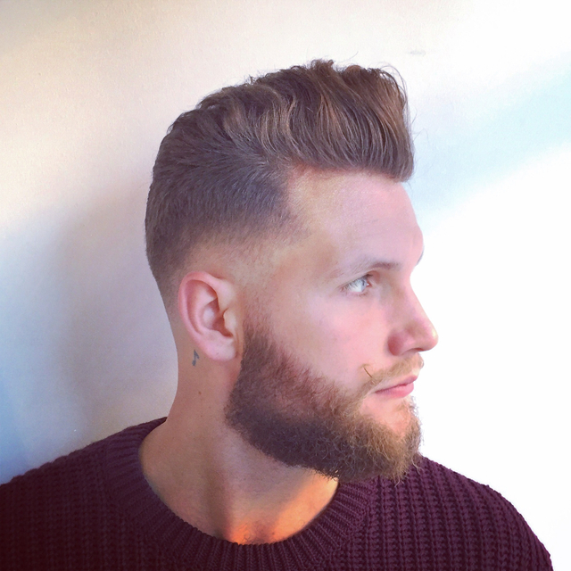 Curly haired pomp with zero fade 