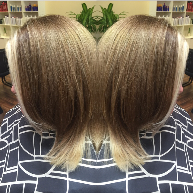 Fun color melt with a touch of ice blonde boldness in front 