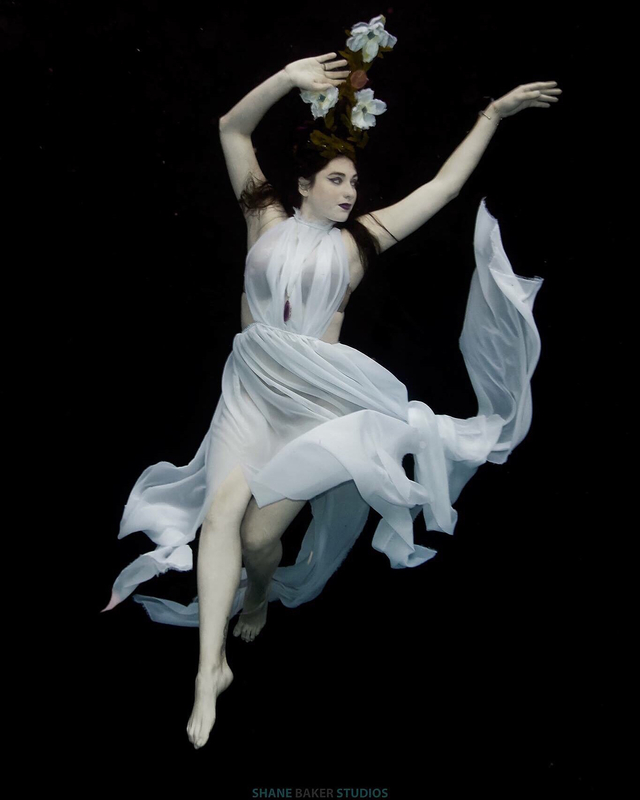 Underwater Queen

Hair/crown: Brynne Dubin Hair
Photo:Shane Baker Studios
Make-up: Kami Tafoya
Model: Clur Natalia