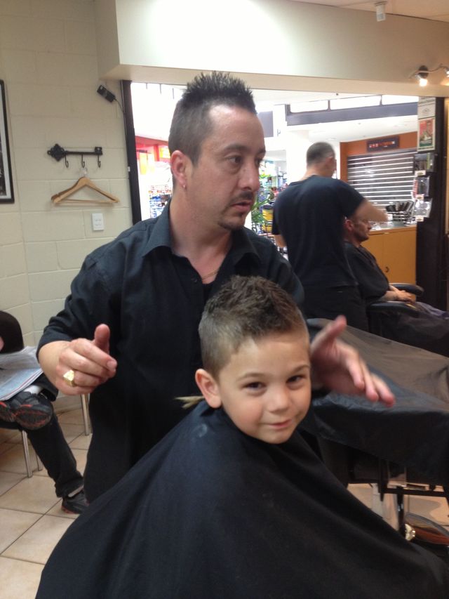 Arch's short spiked cut!