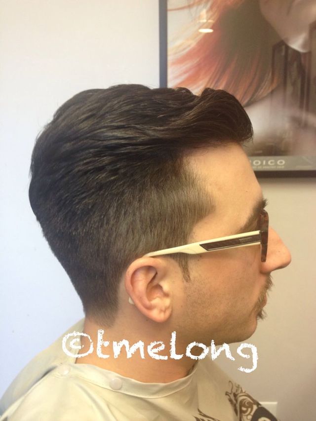 Classic high and tight with a fancy wave. 