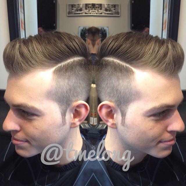Faded up with a hard part and lots of texture. 