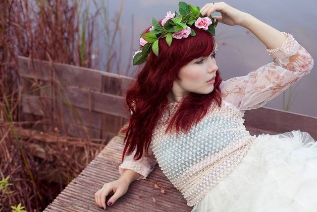 Red waves and flower crown
