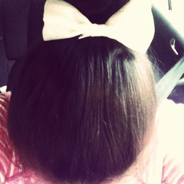 Up Bun topped with a Bow