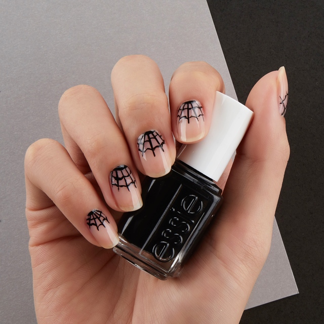 Re sized a3e3d03c153b8d655ad2 halloween cobweb nail art
