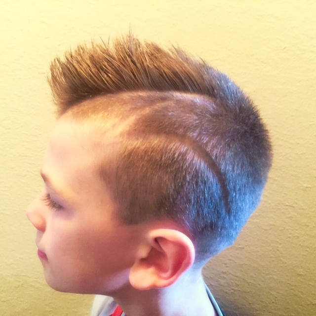 Boy's Haircut with hard part and design
