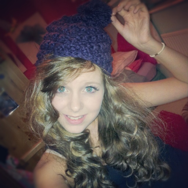beanie and curly hair