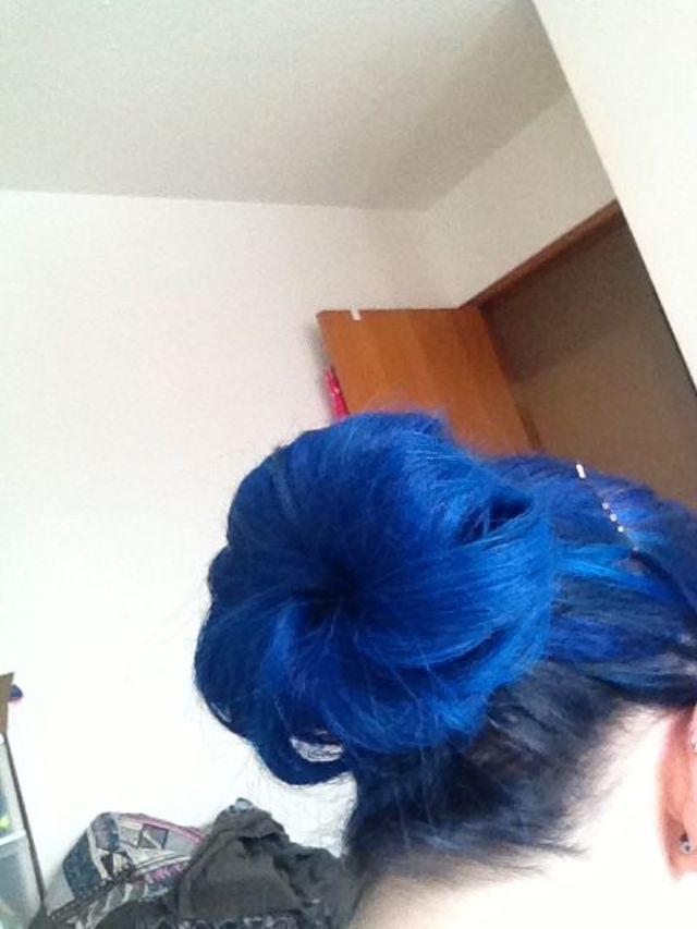 blue hair. sock bun. 