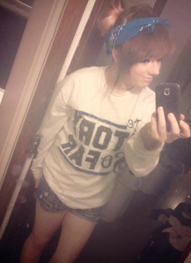 blunt bangs, and bun.