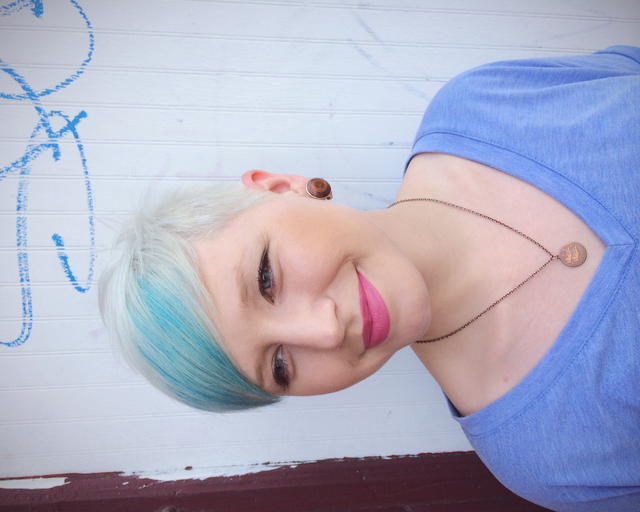 Pale soft blue & platinum blonde with a short textured cut 