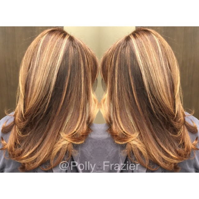 Strategically placed bleach foils 10volume and RoMaxx base 5N with RoMaxx Rozen blown into the hair