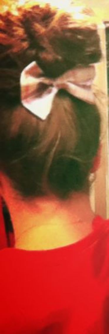 curly fun bun with bow 