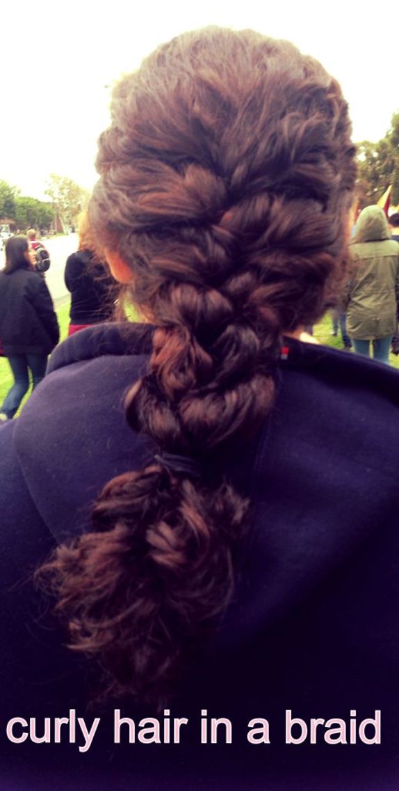 curly hair in a loose braid