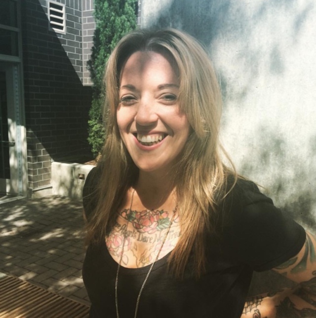 The lovely Michele showing off her rooted blonde.