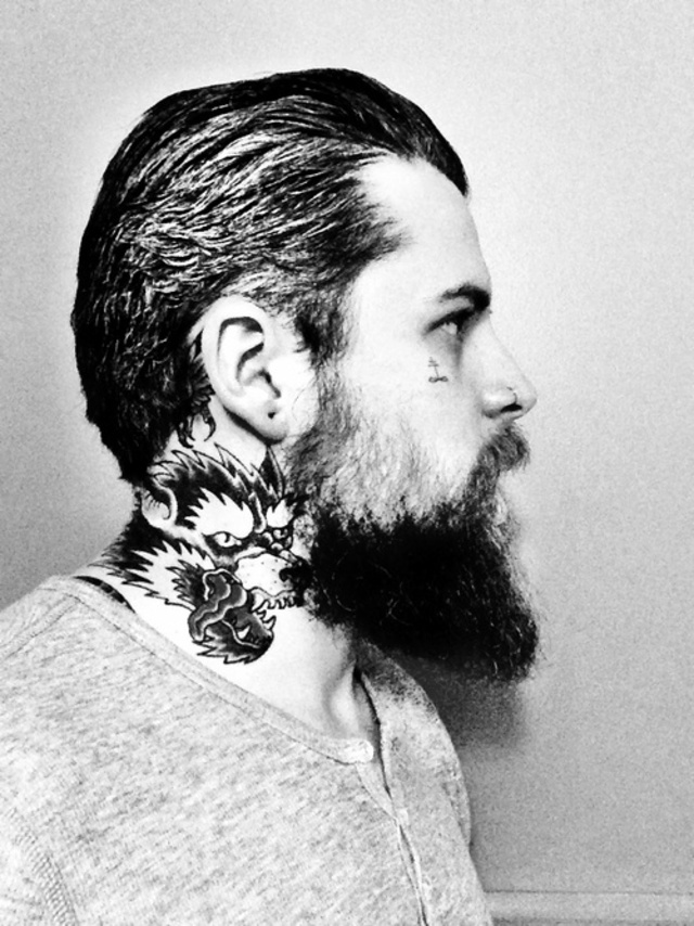 slicked back and bearded