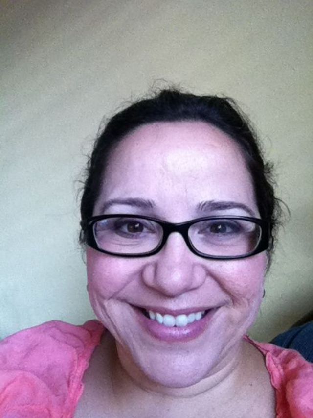 hair pulled back with glasses