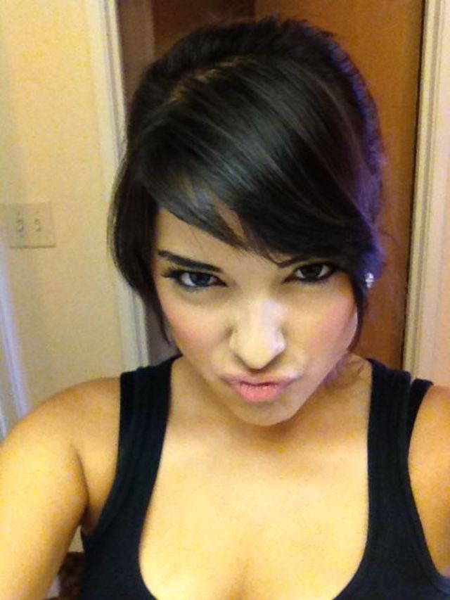 high messy bun with swoop bangs