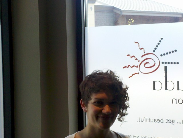 Asymmetrical  short curly cut at Vasuda Salon 