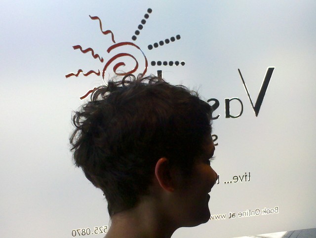 Asymmetrical  short curly cut at Vasuda Salon 2