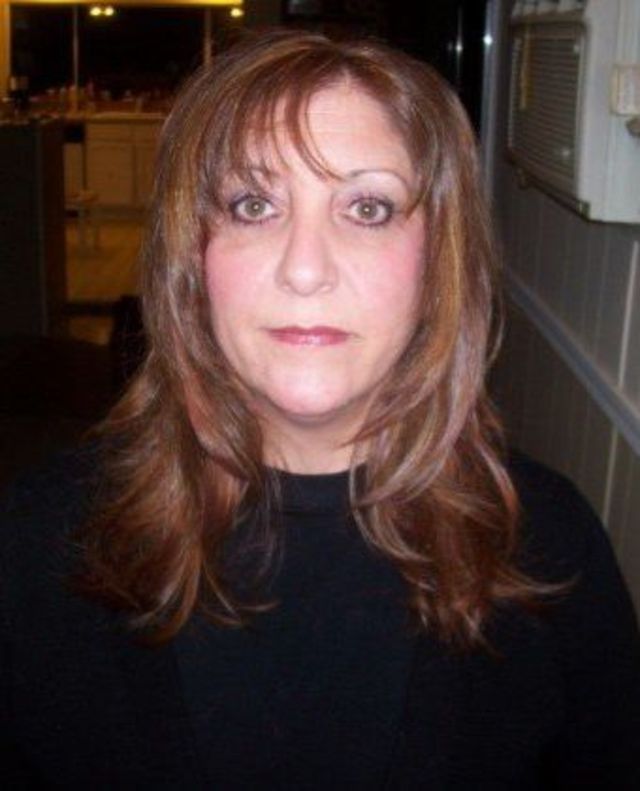 medium layered cut with fringe..medium mocha brown with red/highlights!