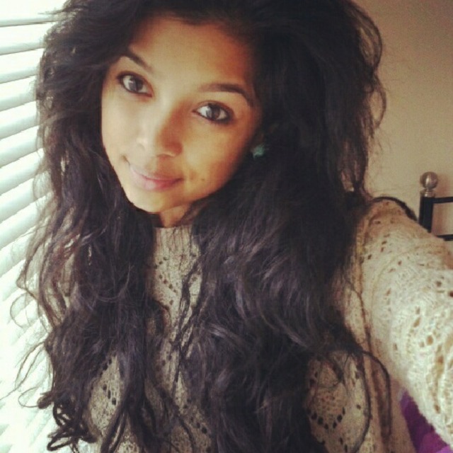 messy big dark naturally curly hair