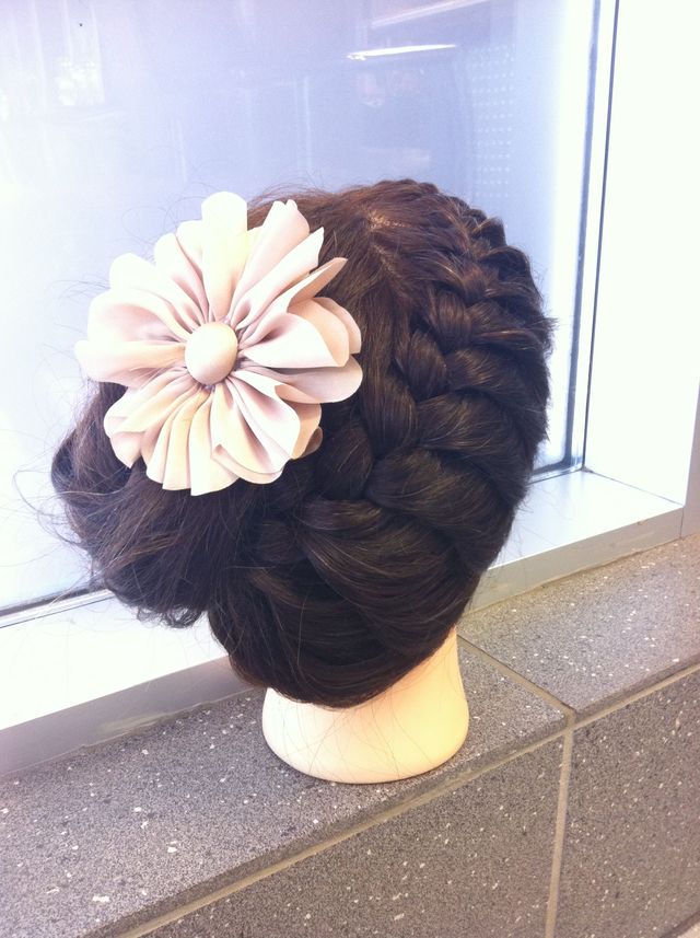 messy braided side bun 