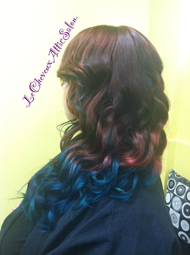 ombré flowing clots of teal orchid an base red