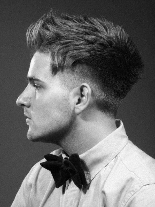 sharp clipper cut with slight undercut at the temples 