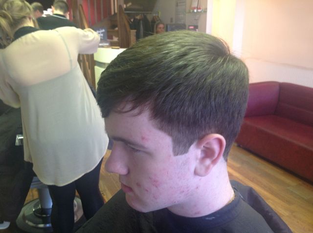 short back and sides, textured top with fringe 