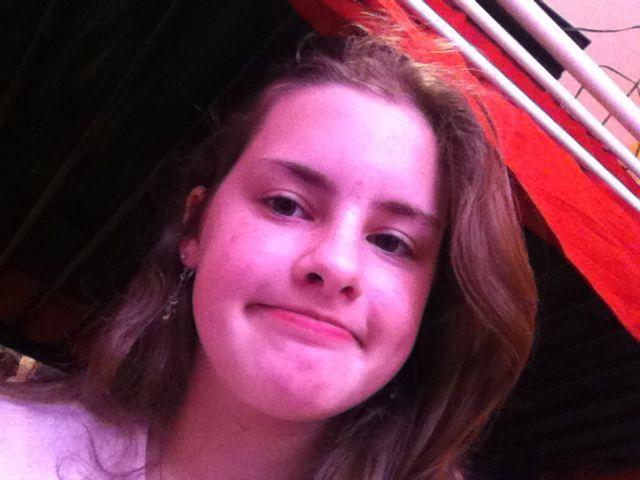 to the side and curled