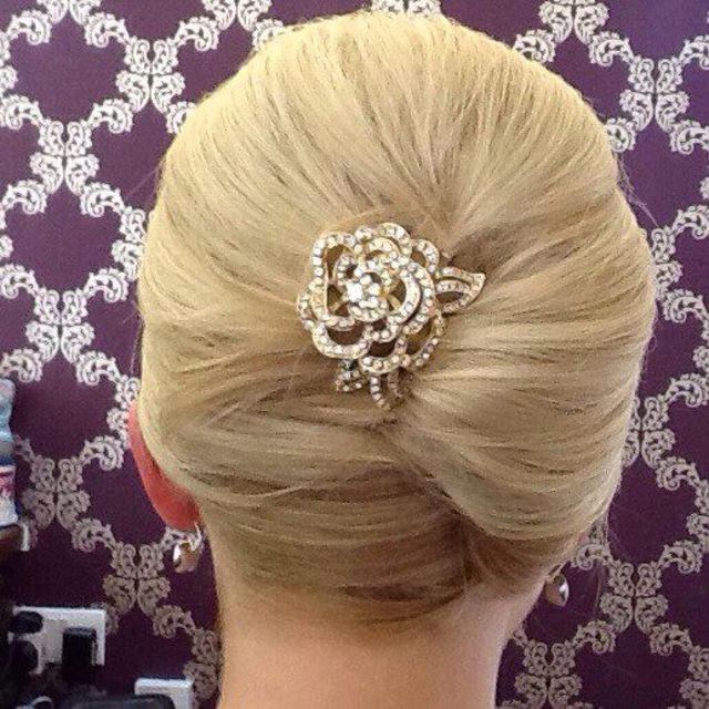 updo with rose hair pin