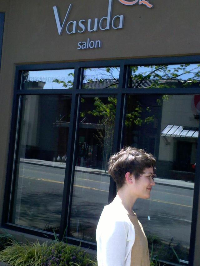 Asymmetrical  short curly cut at Vasuda Salon 3