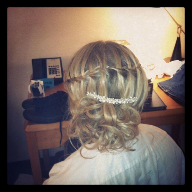 waterfall braid with side bun bride 