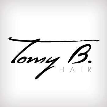 Tomy B.